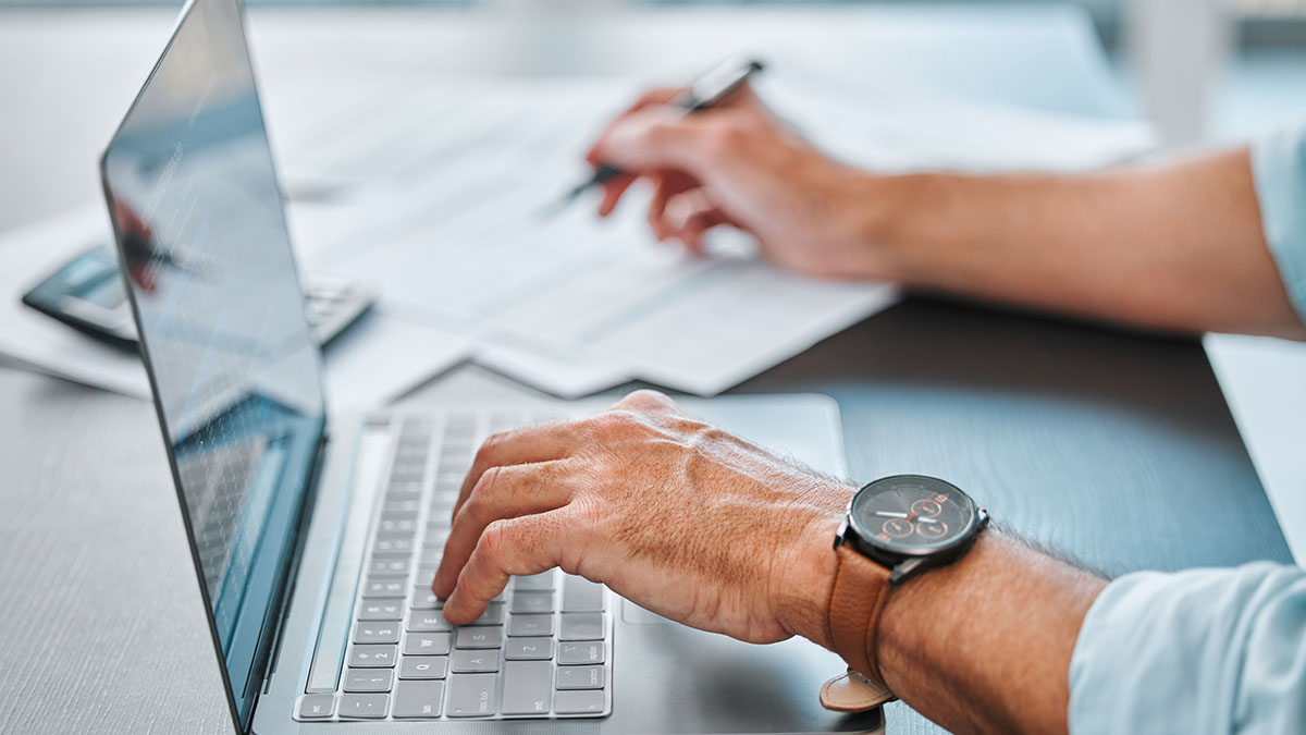 Man creating a budget for his business