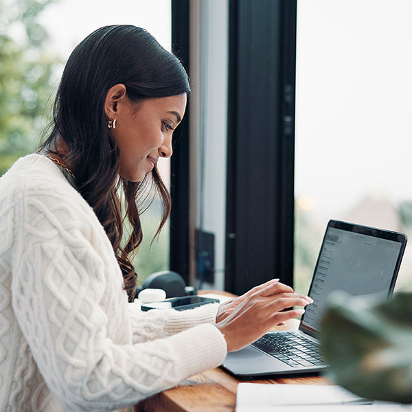 HR professional working from home on benefit plan audit